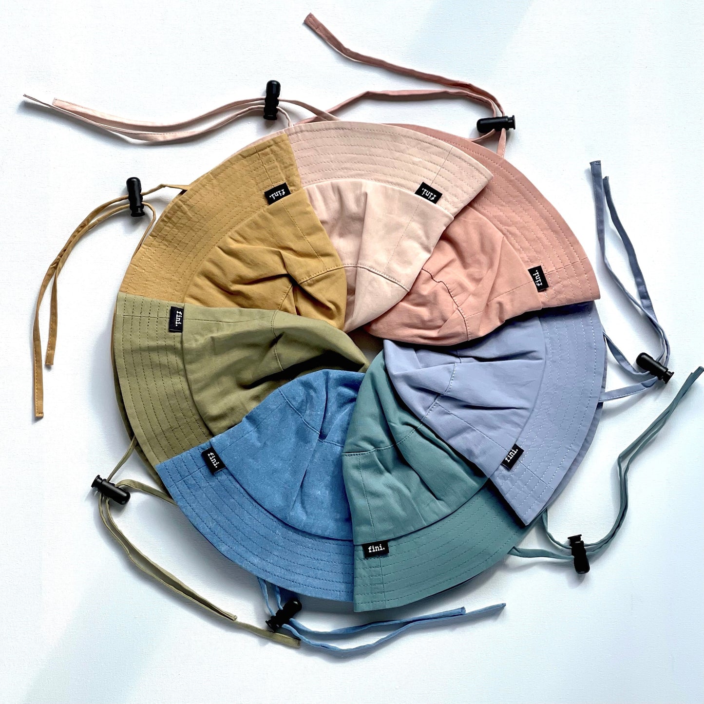 fini. bucket hat | light pink-fini. the label