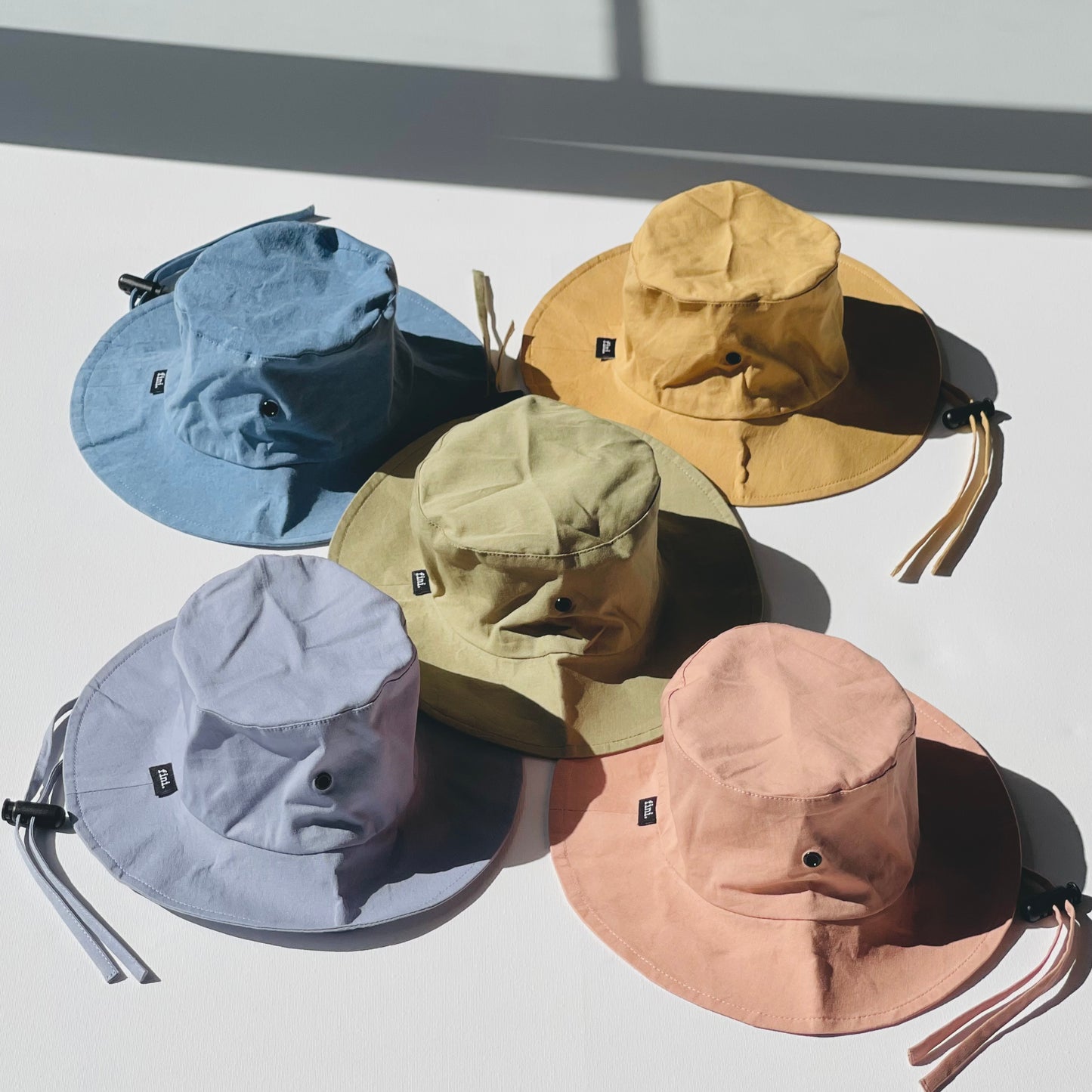 fini. relaxed bucket hat | gold-fini. the label