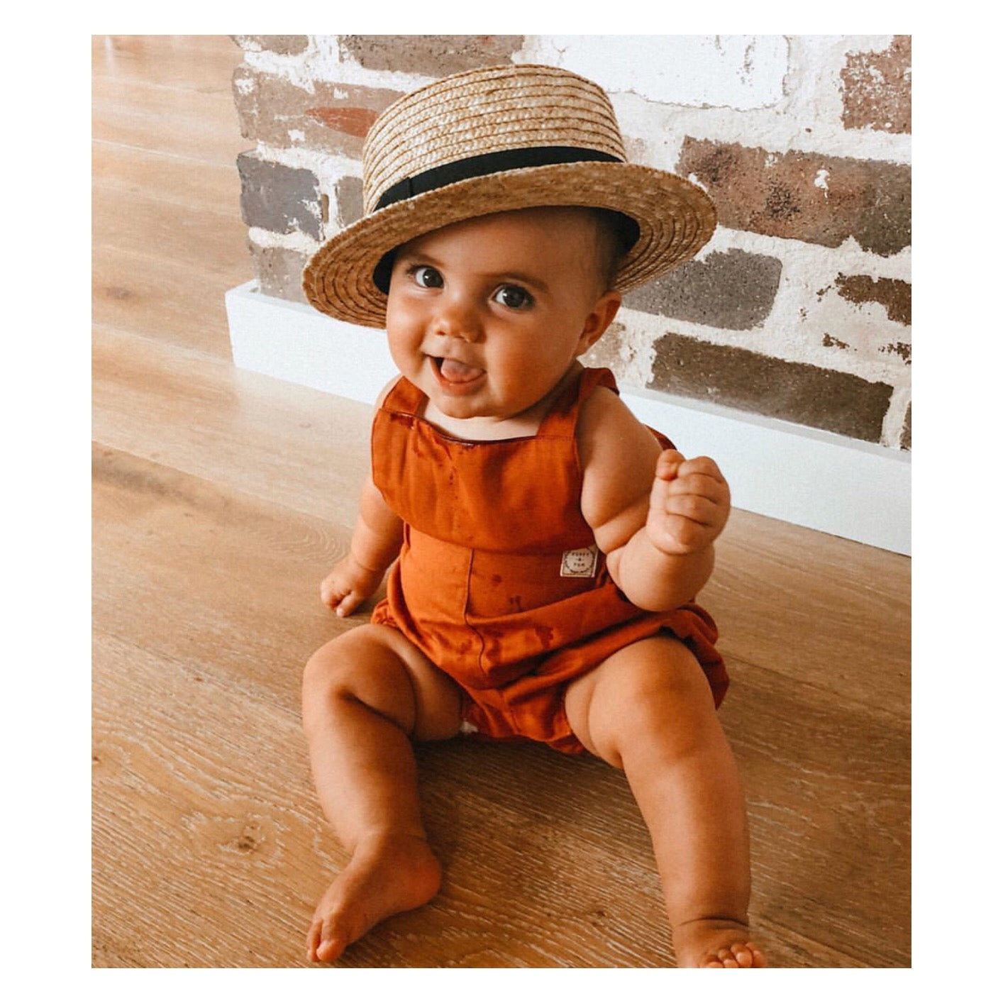 fini. straw boater-fini. the label